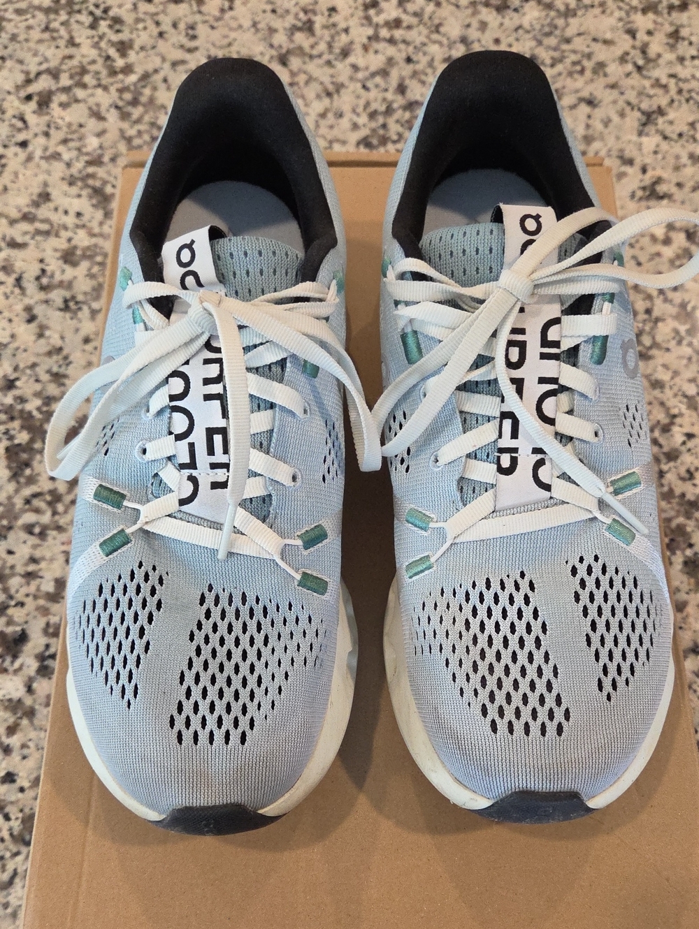 On Running Light Blue and White Women's Athletic Shoes